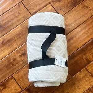 Cream Textured Blanket with Black Straps